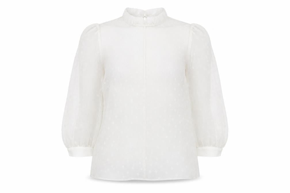 Front view of Primark Women's White Polka Dot Sheer Puff Sleeve Blouse, size 10