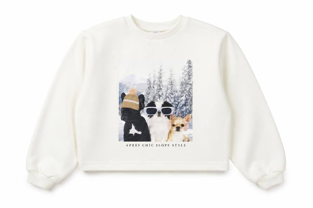 Front view of Marks & Spencer girls’ ivory dog print pullover sweatshirt 10-11 years