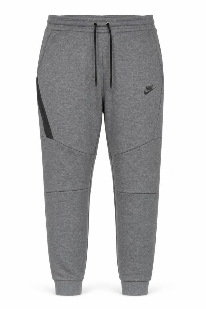 Front view of Nike men’s grey jogger trousers m regular fit knit sweatpants