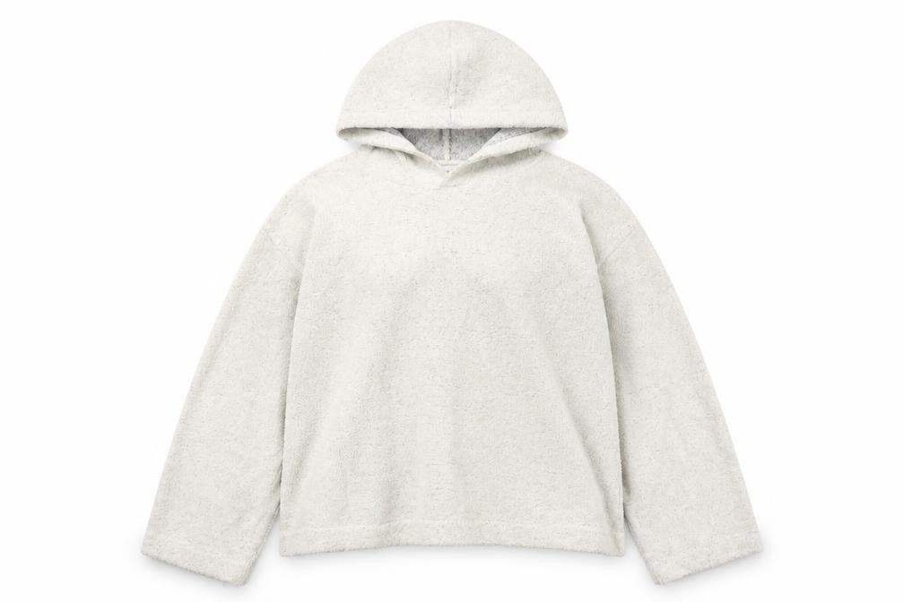 Front view of Weekday women’s beige hooded pullover sweatshirt, size M, relaxed fit