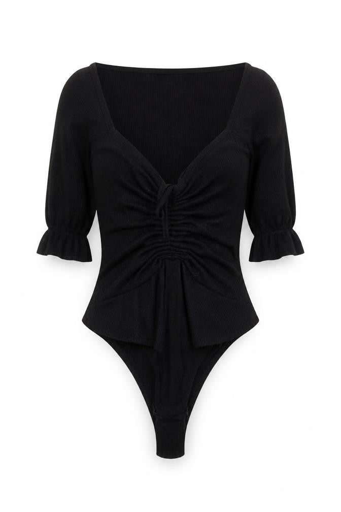 Front view of PRETTYLITTLETHING women’s black bodysuit, size UK 4, ruched puff sleeve