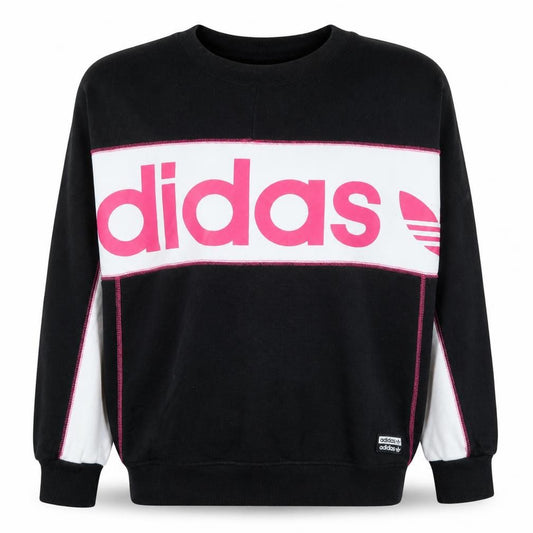 Front view of Adidas women’s black pink crew neck pullover sweatshirt, size UK 10
