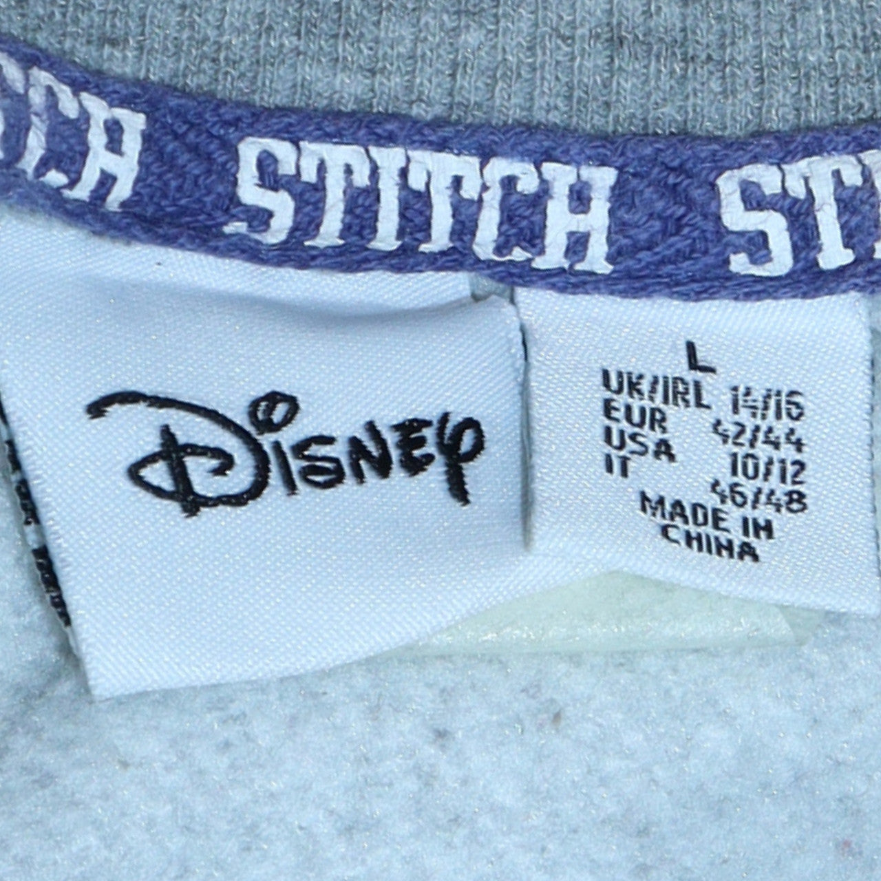 Disney Women’s Grey Stitch Sweatshirt L 14/16 Pullover Crew Neck