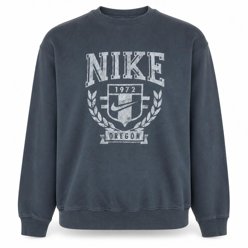Front view of Nike women’s black xs pullover crew neck graphic print sweatshirt