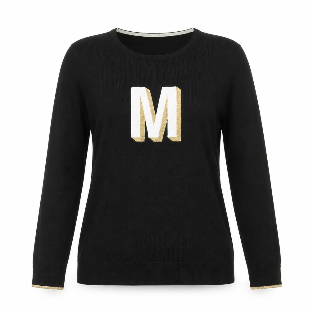 Front view of Oliver Bonas women’s black small jumper with gold m logo