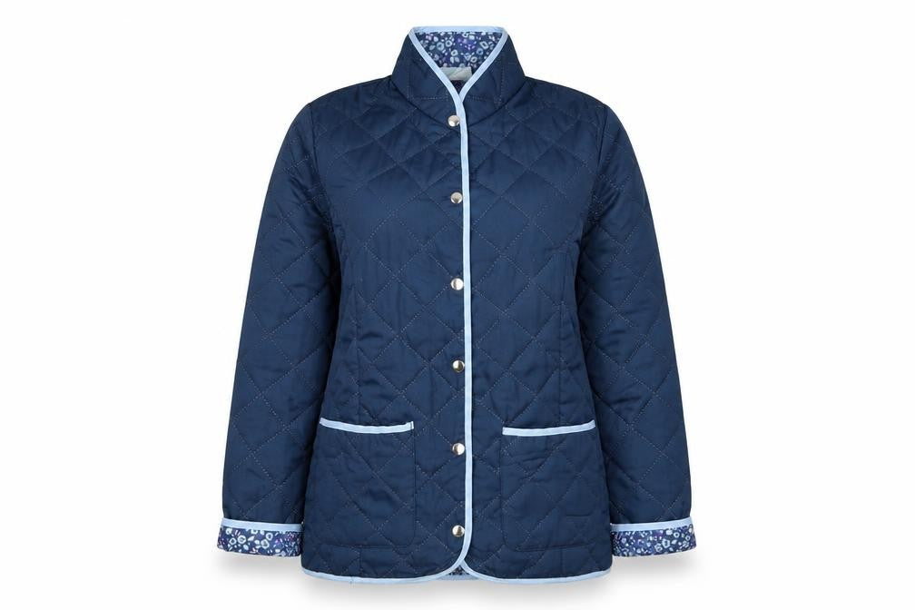 Front view of Nathalie Andersen Women's Blue Quilted Mid-Length Jacket, size 10/12