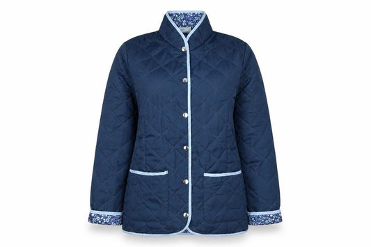 Front view of Nathalie Andersen Women's Blue Quilted Mid-Length Jacket, size 10/12