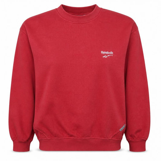 Front view of Reebok women’s red crew neck pullover sweatshirt, size UK 12
