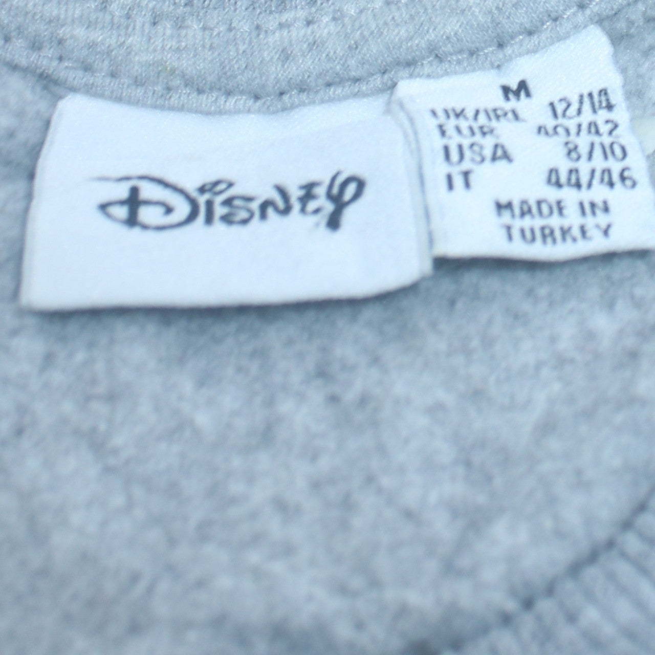 Disney Womens Grey Stitch Sweatshirt Pullover Size M 12/14 Graphic Print