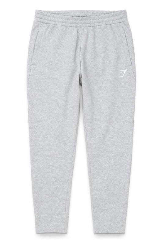 Front view of Gymshark Men's Grey Slim Fit Jogger Trousers, size M, Elastic Waist