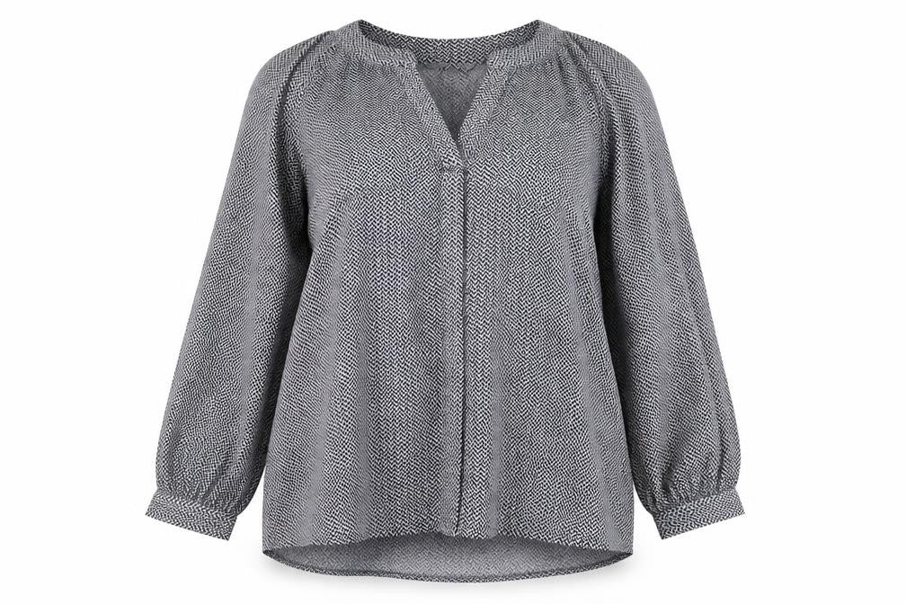 Front view of H&M women’s black geometric tunic blouse, size XS, long sleeve