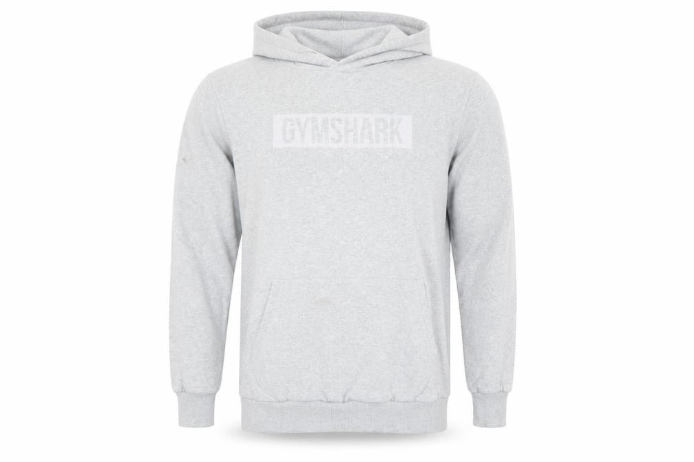 Front view of Gymshark men’s grey pullover hoodie, size S, regular fit fleece logo
