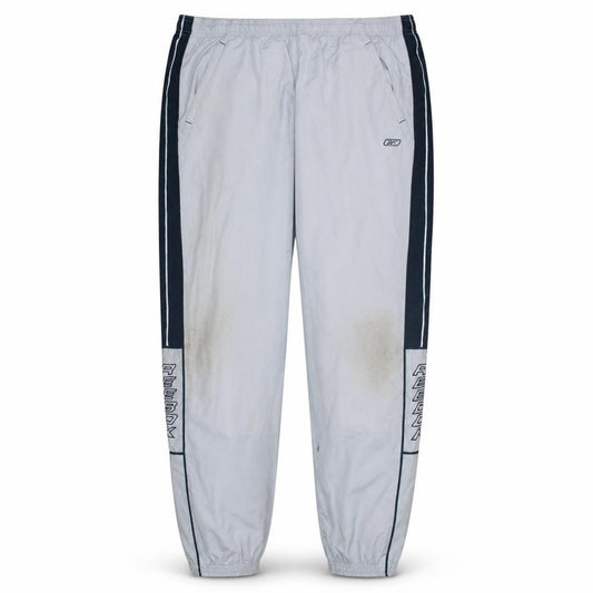 Front view of Reebok men’s grey track pants l regular fit elastic waist sportswear