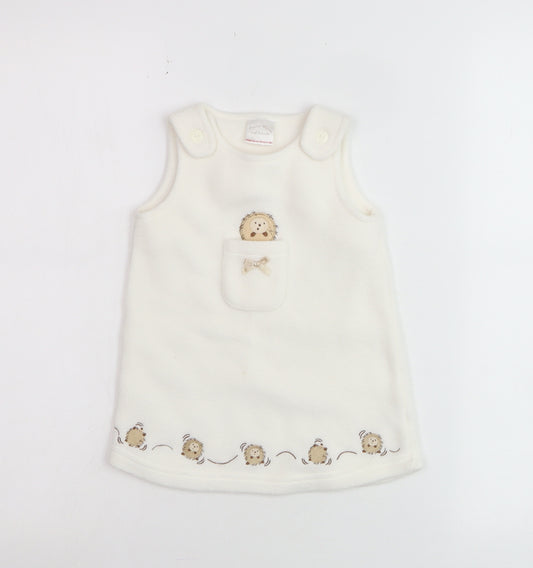Front view of Minimode unisex baby ivory fleece pinafore dress 3-6 months hedgehog embroidered