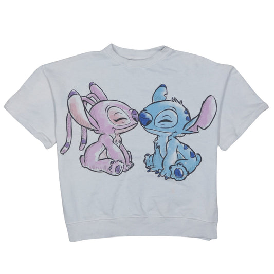 Front view of Zara girls’ white disney stitch & angel graphic pullover sweatshirt 11-12 years