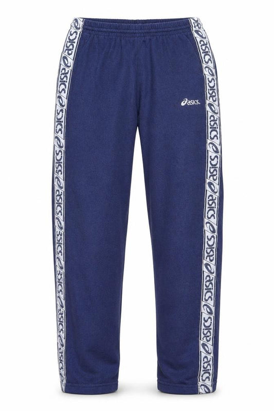 Front view of Asics boys’ blue track pants 20 years elastic waist fleece trousers