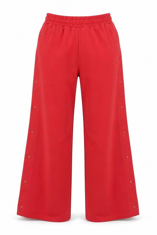Front view of Next Women's Red Track Pants, size 6R, Elastic Waist Snap Side