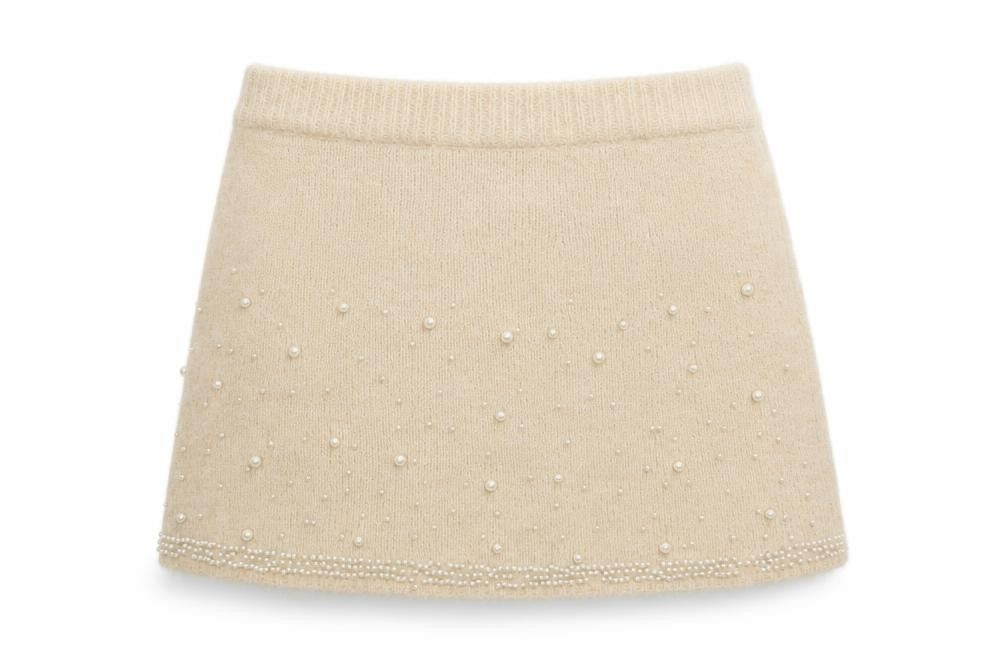 Front view of Savida women’s beige beaded knit a-line skirt, size UK 14