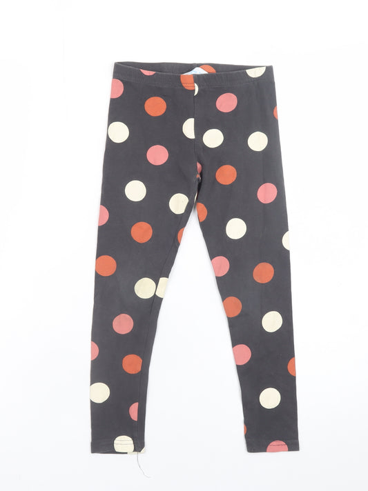 Front view of Primark girls’ black polka dot ankle leggings, size 6-7, years organic cotton