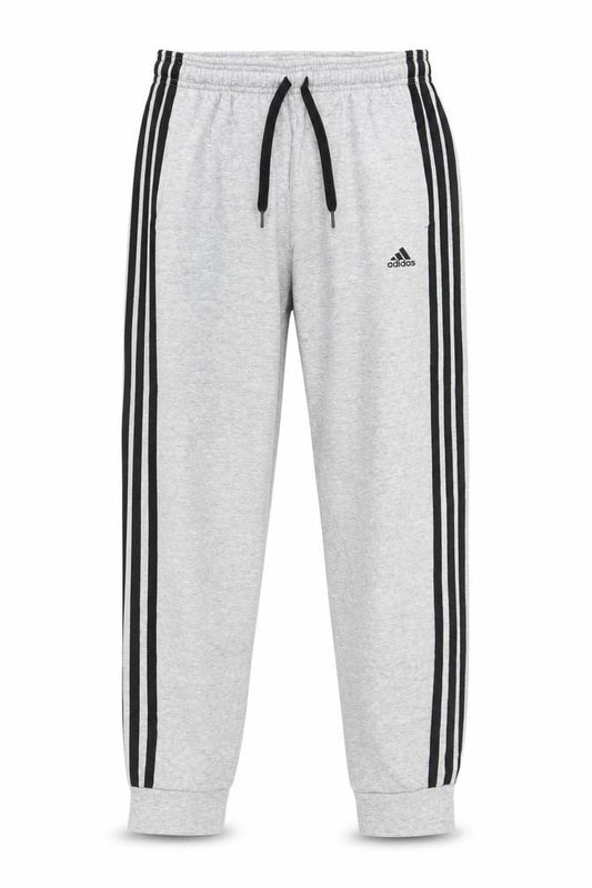 Front view of Adidas boys’ grey 13-14 years track pants with side stripes & drawstring waist