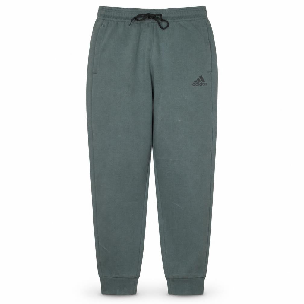 Front view of Adidas Men's Green Jogger Trousers, size M, Regular Fit