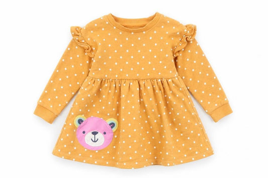 Front view of Dunnes girls’ beige polka dot long sleeve skater dress 12-18 months