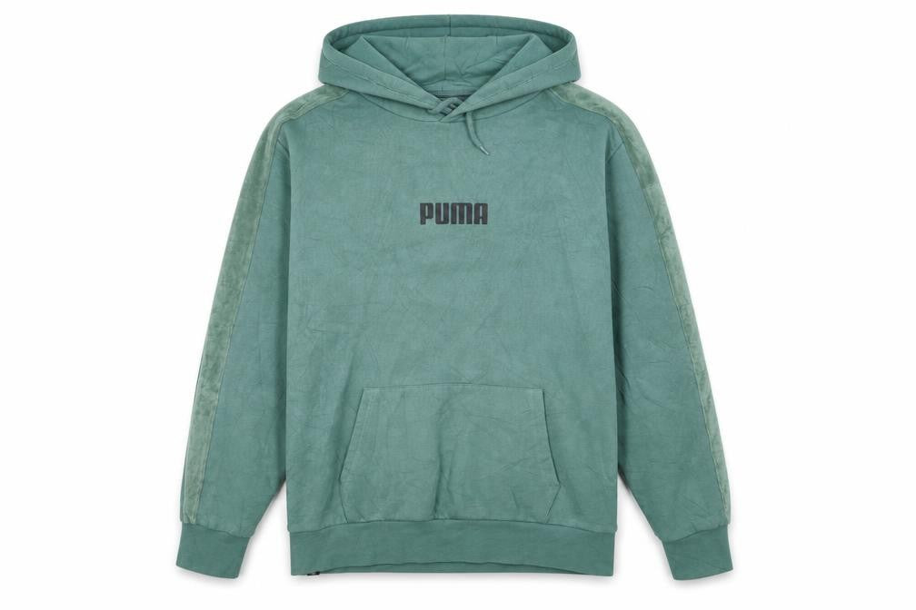 Front view of PUMA Women's Green Pullover Hoodie, size S, Relaxed Fit Casual Style