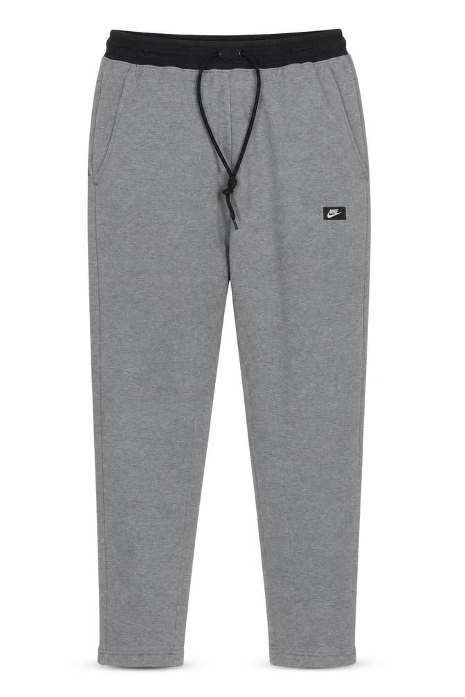 Front view of Nike Men's Grey Jogger Trousers M Regular Fit Cotton Blend