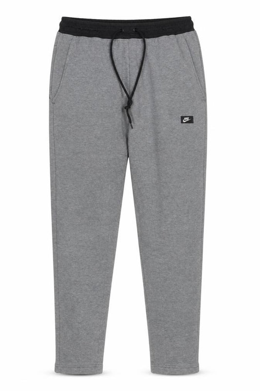 Front view of Nike Men's Grey Jogger Trousers M Regular Fit Cotton Blend