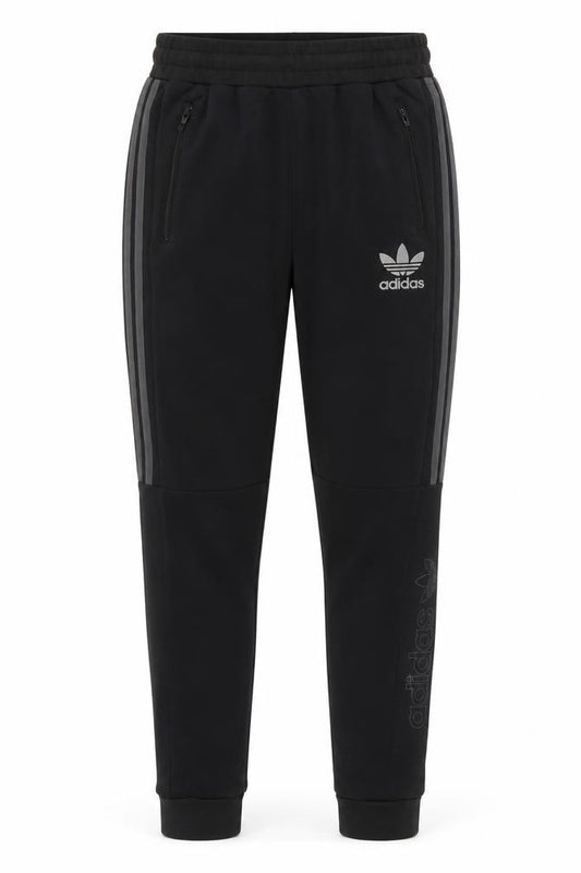 Front view of Adidas Men’s Black Jogger Trousers, size S, Tapered Fit with Zip Pockets