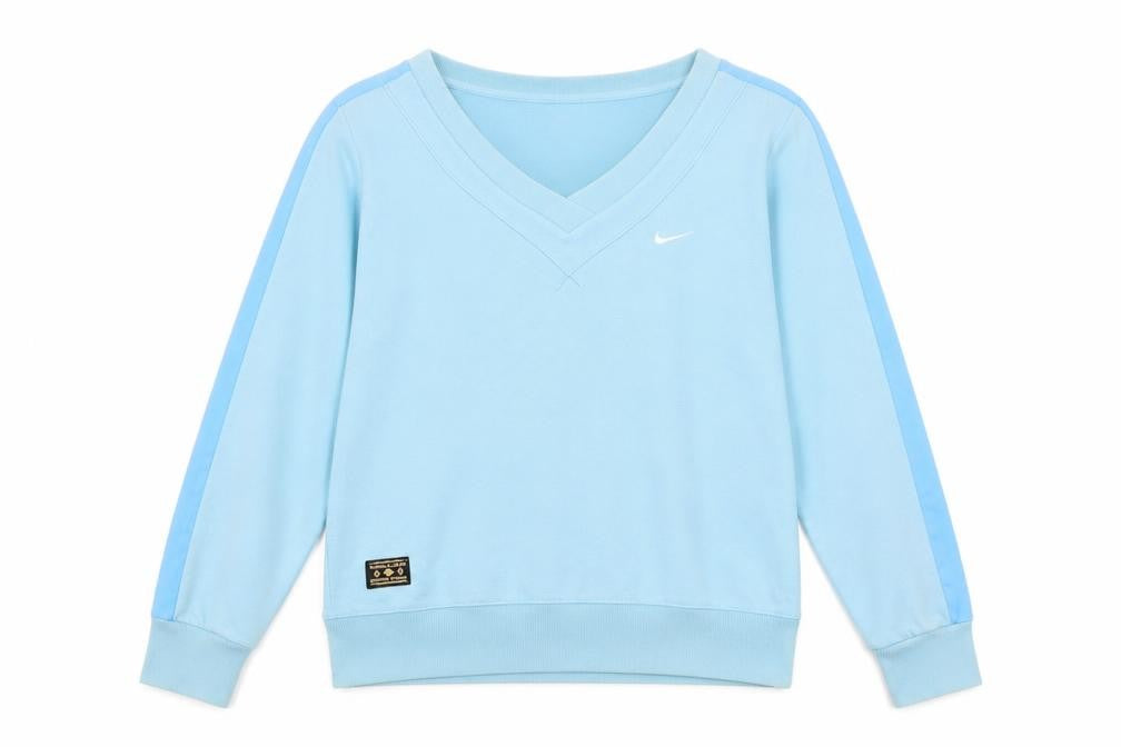 Front view of Nike Women Blue V-Neck Pullover Sweatshirt, size L, 14/16