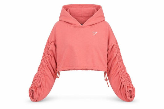 Front view of Gymshark women’s pink cropped pullover hoodie, size S, lightweight