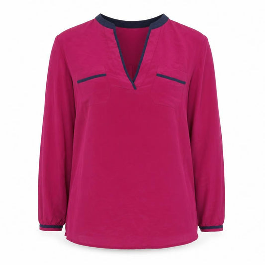 Front view of Tory Burch women’s pink long sleeve silk polo top, size S