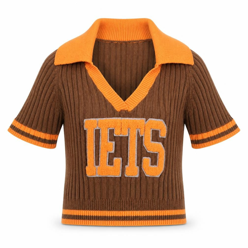 Front view of Iets Frans girls’ brown & orange ribbed v-neck jumper, size M