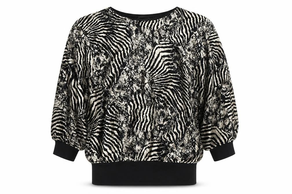 Front view of Western Connection women’s black animal print tunic blouse s