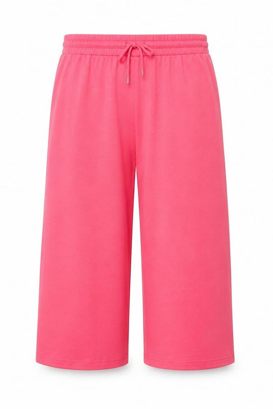Front view of Dunnes Women's Pink Cropped Wide-Leg Viscose Trousers, size M