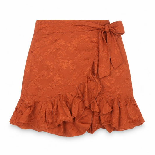 Front view of Urban Outfitters women’s brown wrap ruffle short skirt l viscose