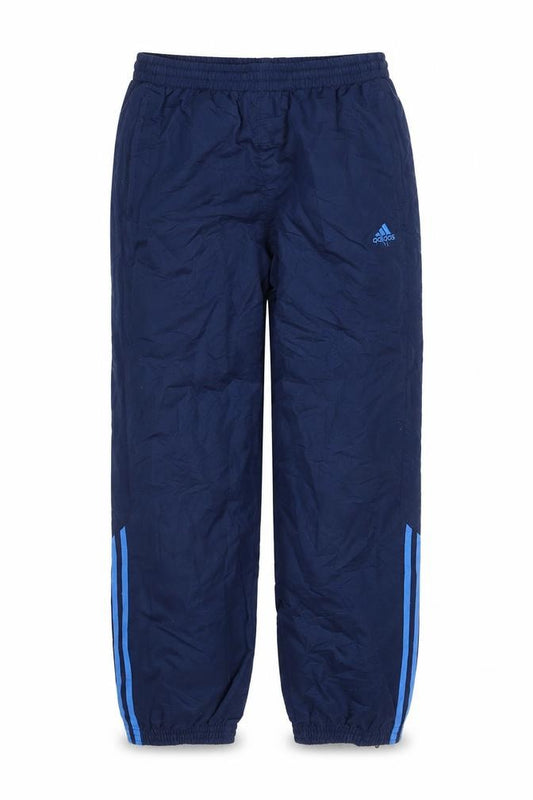 Front view of Adidas boys’ blue track pants 10 years regular fit activewear trousers