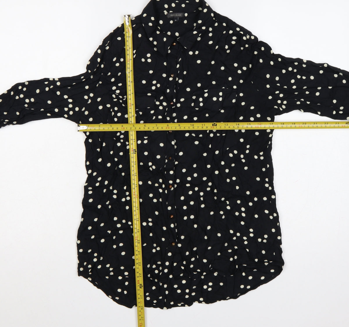 Close-up detail of River Island Women’s Black Polka Dot, size UK 10, Button-Up Shirt