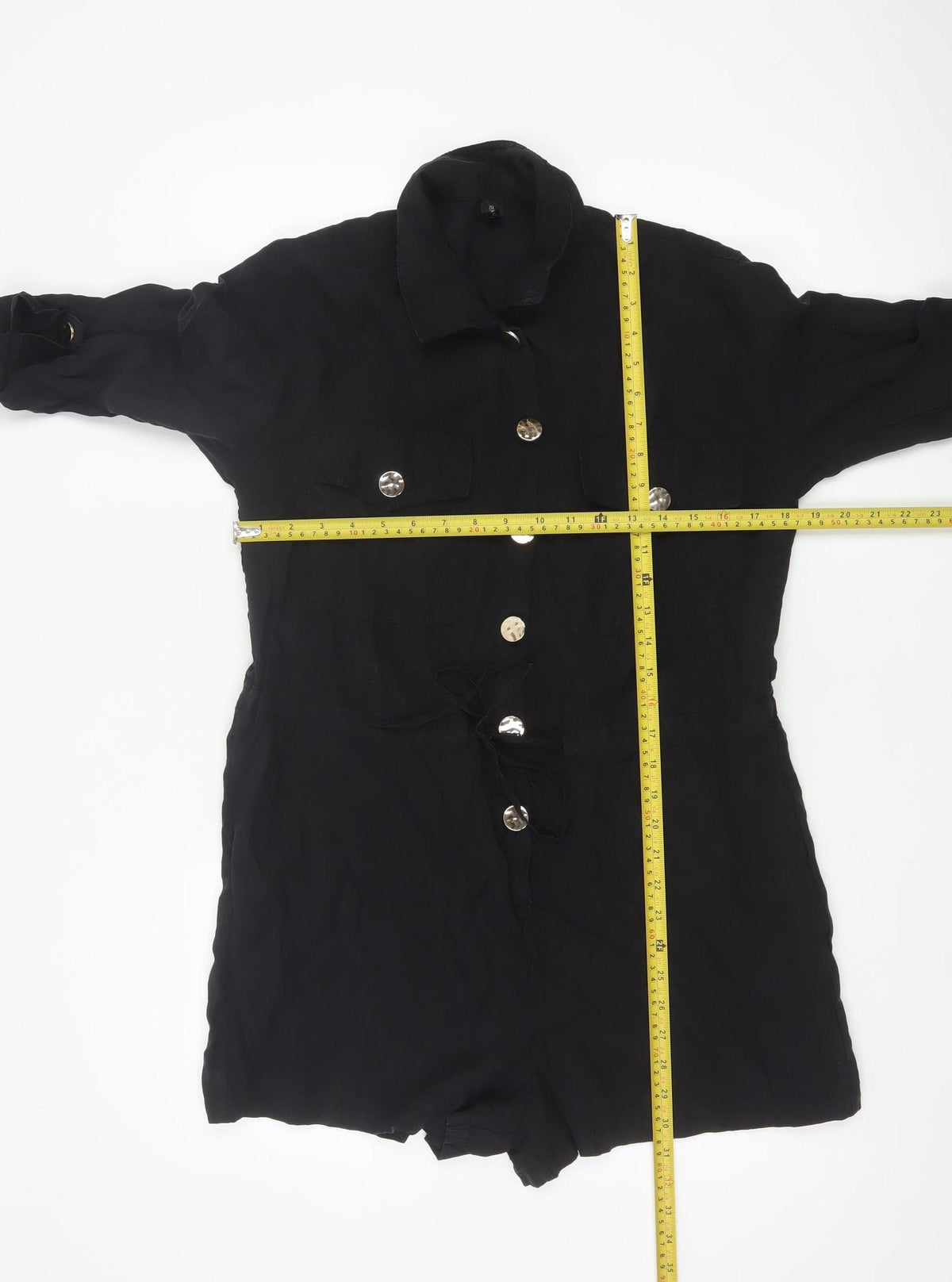 Close-up detail of River Island Women Black, size 10, Utility Button Belted Long Sleeve Playsuit