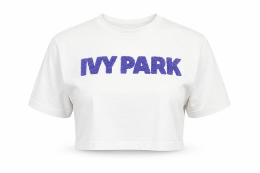 Front view of Ivy Park Women White XS Cropped Jersey T-Shirt Purple Logo