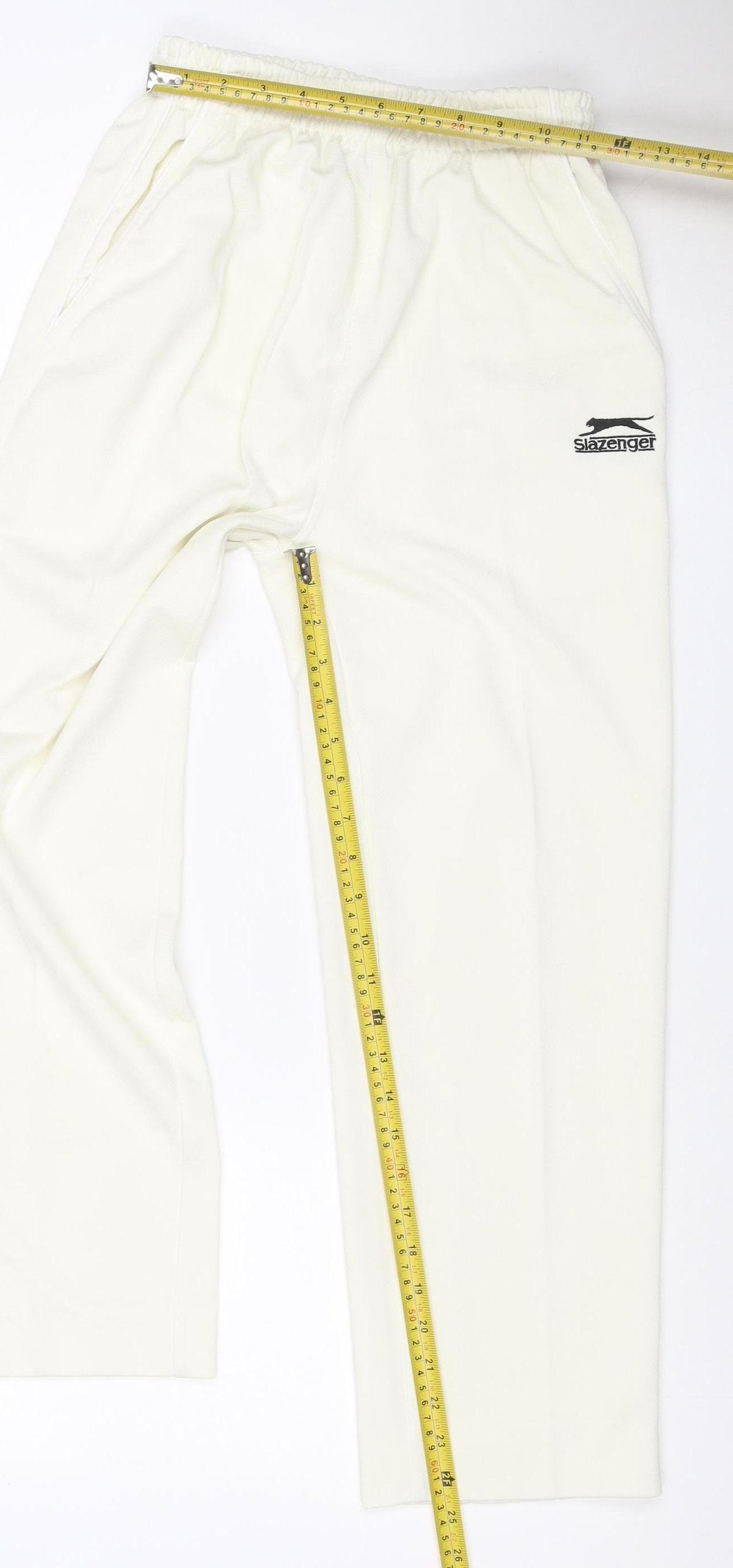Close-up detail of Slazenger boys’ ivory 9-10 years track pants straight leg