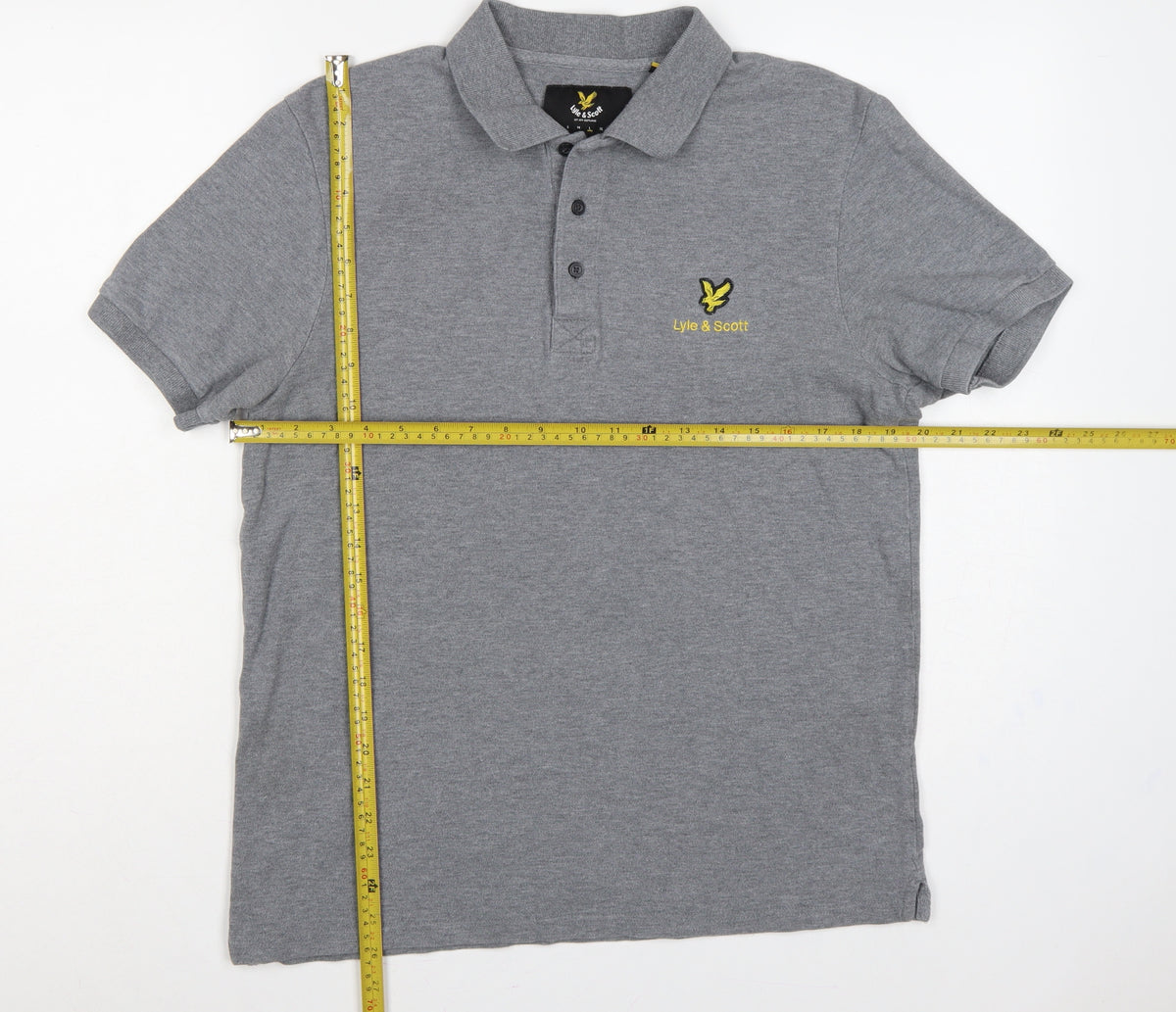 Close-up detail of Lyle & Scott men’s grey logo short sleeve polo shirt, size L