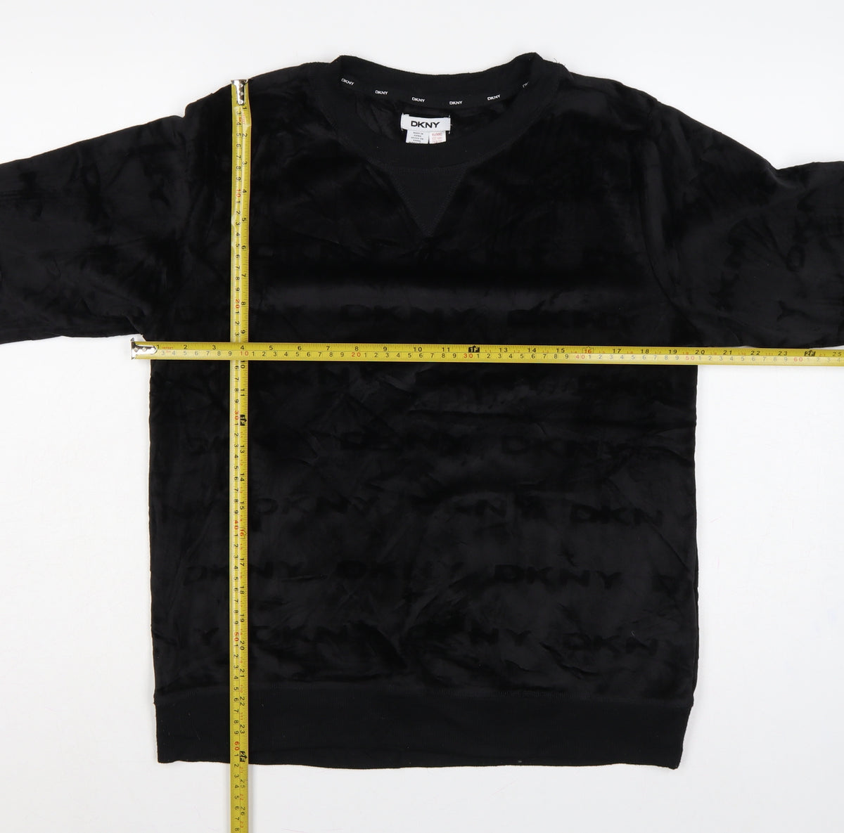 Close-up detail of DKNY Women’s Black M Logo Velour Pullover Sweatshirt