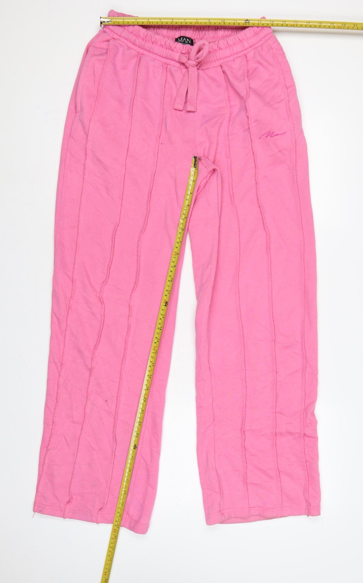 Close-up detail of boohooMAN Men’s Pink S Sweatpants Drawstring Elastic Waist Logo Joggers