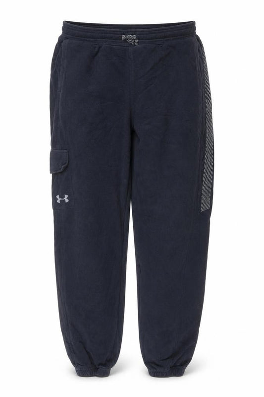 Front view of Under Armour boys’ black xl loose fit jogger track pants reflective