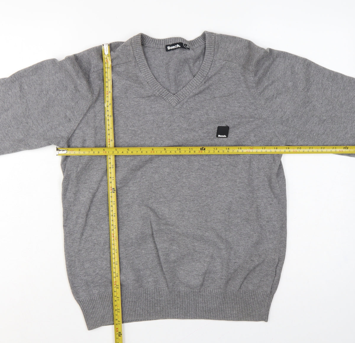Close-up detail of Bench Men’s Grey, size S, V-Neck Logo Knit jumper