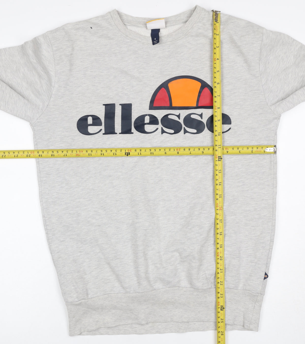 Brand and care label for Ellesse Women’s Grey Logo Crew Neck Pullover Sweatshirt, size UK 8