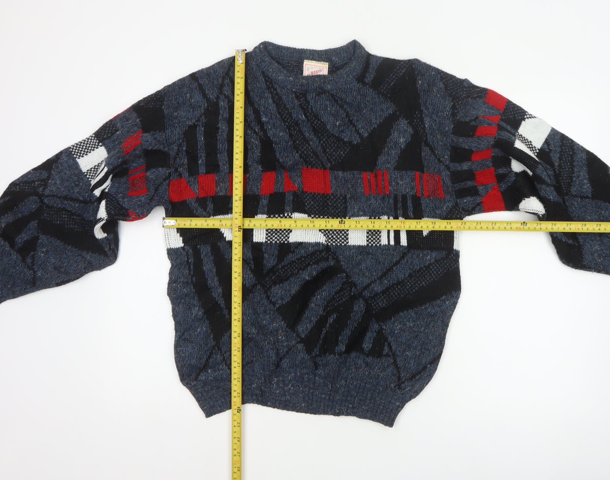 Close-up detail of Aviator men’s blue m chunky knit geometric retro 90s jumper