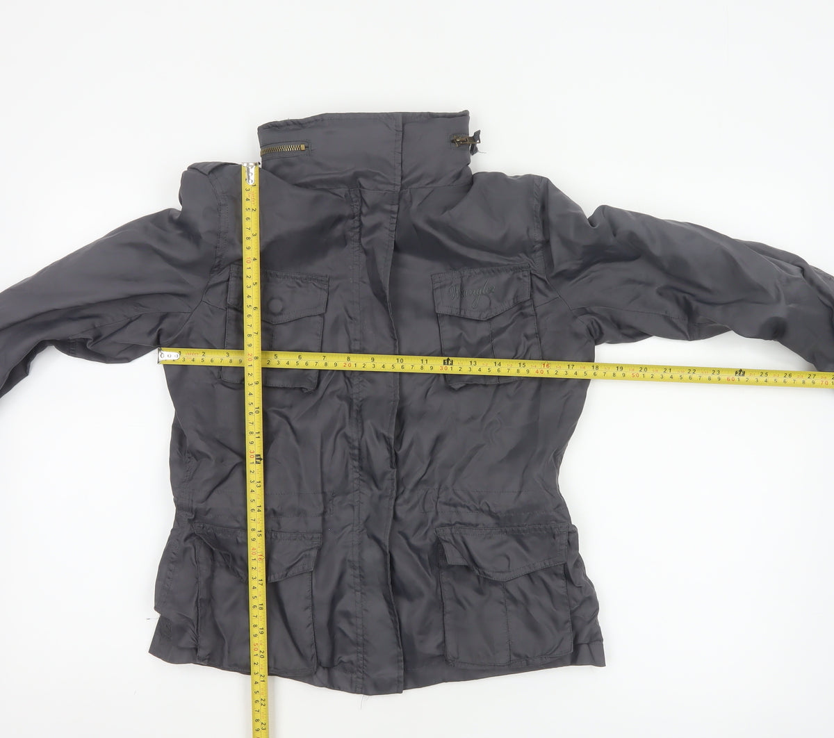 Close-up detail of Wrangler Women’s Black M Military Jacket Collared Logo Pocket Zip